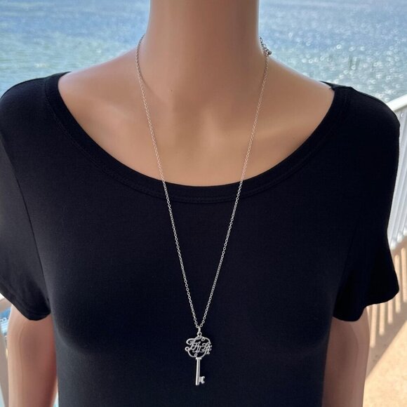 Traci Lynn Necklace Faith Key Pendant Long length Silver Tone NWT - Picture 2 of 2